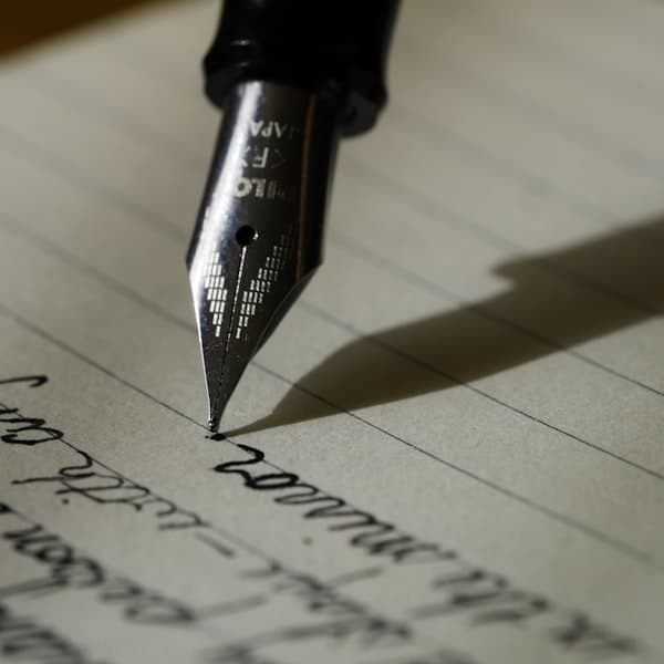 A handwritten note on folded paper